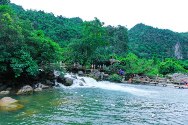 Quang Binh, Vietnam - July 13, 2018: Nuoc Mooc spring - Mooc stream Phong Nha Ke Bang national park