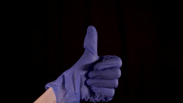 Clip Shows Person Putting Pair Blue Latex Gloves Gives Camera — Stock Video