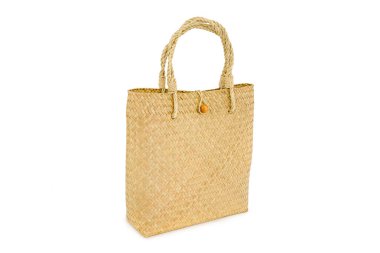 Beyaz ba izole kurutulmuş su sümbül yapılmış el yapımı çanta