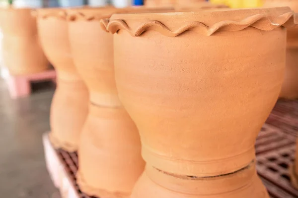 Empty ceramic brown flower pots for sale in Garden shop, Lots of