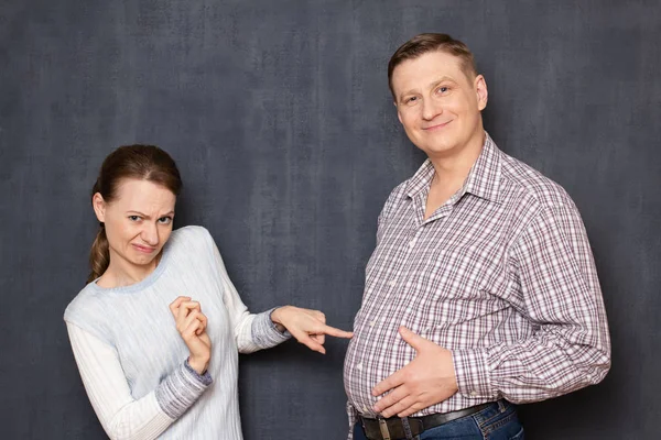 This is disgusting! Studio waist-up shot of dissatisfied woman t