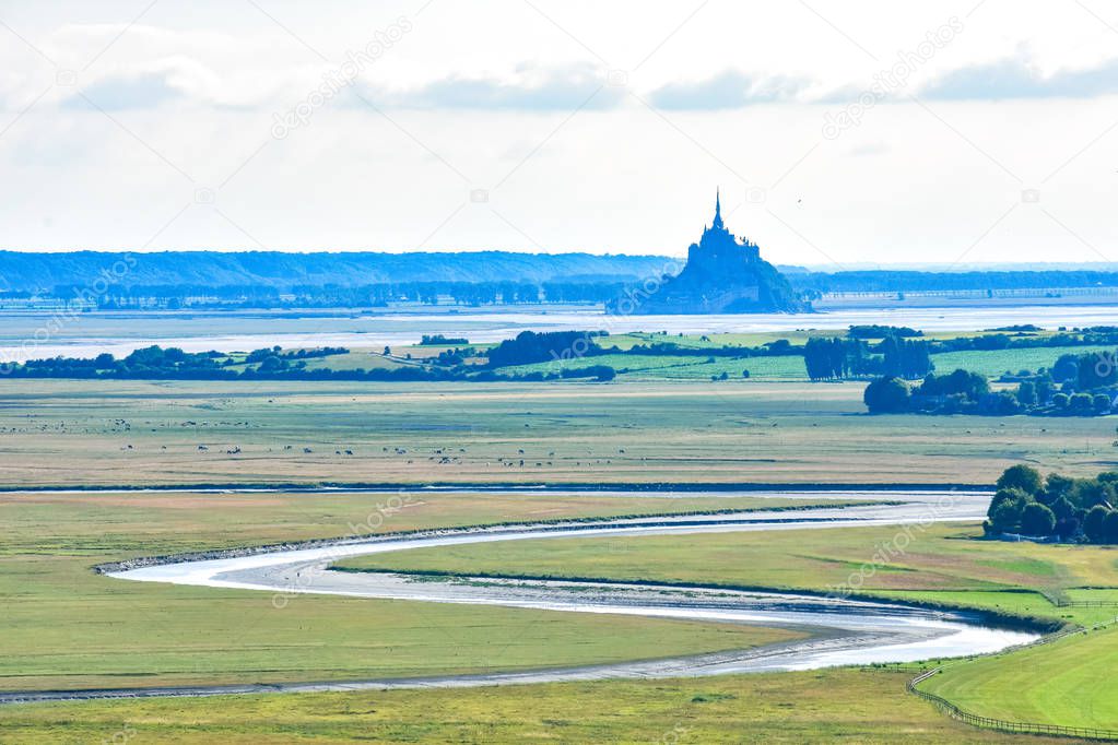 Rio makes its way between fields and farmland up to Mont Saint Michel, France