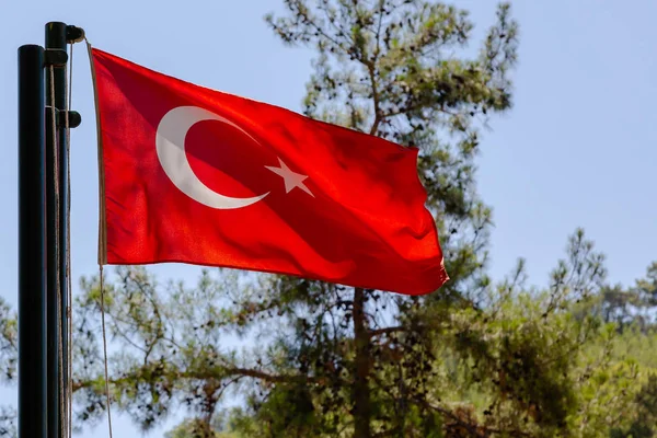 National flag of Turkey against the sky