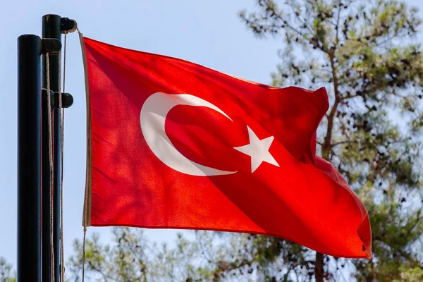 National flag of Turkey against the sky