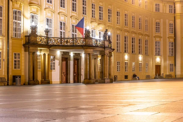 Entrance door with balcony to the Archives of Prague Castle on Third Courtyard by night, Prague, Czech Republic — Stock Photo, Image