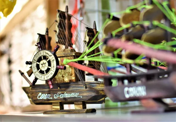 A wooden souvenir model ship on display at a shop in Coron, Palawan in the Philippines