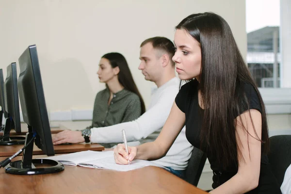 Group of students engaged in the computer class