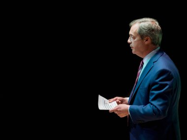 Nigel Farage, Brexit party leader, giving a speech clipart