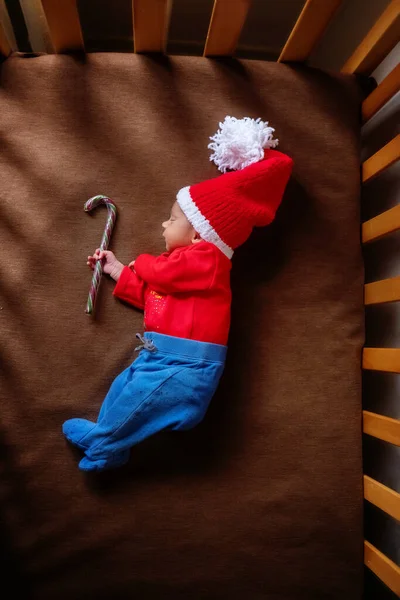 Cute Newborn Baby Santa Hat Lollipop Sleeping Baby Closeup Portrait — Stock Photo, Image
