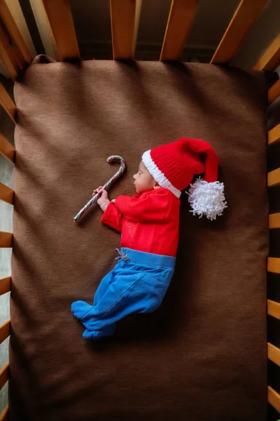 Cute Newborn Baby Santa Hat Lollipop Sleeping Baby Closeup Portrait — Stock Photo, Image