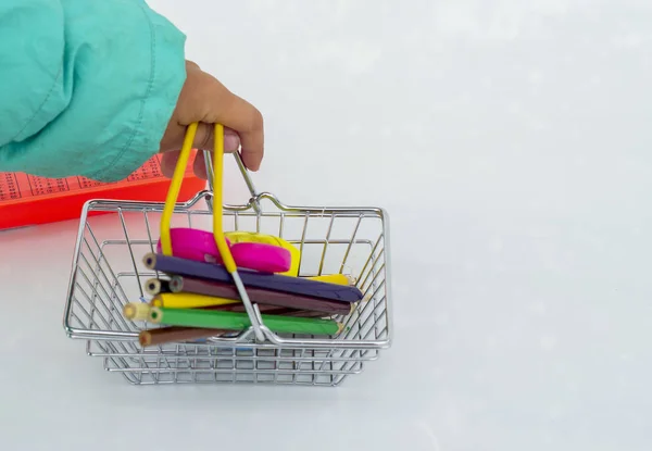 colored pencils in a trolley, back to school, office tools