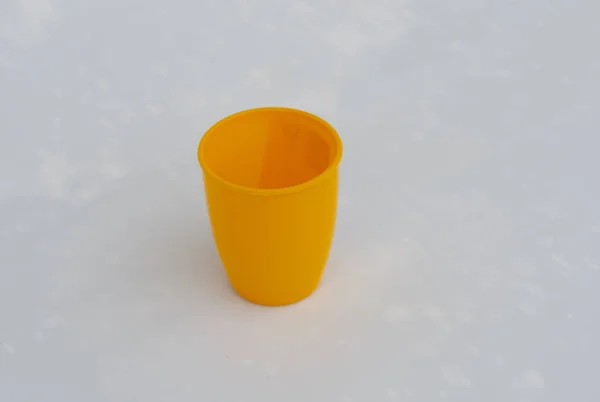 bright yellow mug on a white background
