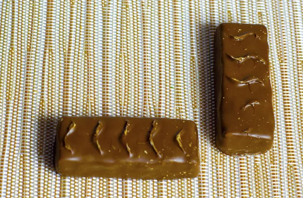 Barras Chocolate Sobre Fondo Beige —  Fotos de Stock