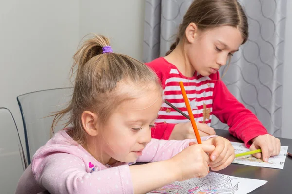 Two Girls Drawing Pensils Coloring Sheet Paper — Stock Photo, Image