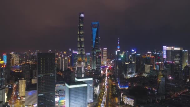 Shanghai City på natten. Lujiazui-distriktet. Kina. Utsikt från luften — Stockvideo