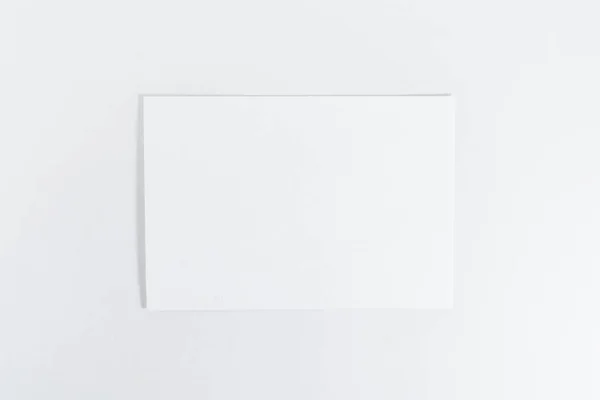 Mockup van papieren blad op witte achtergrond — Stockfoto