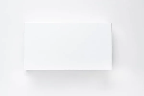 Witboek vak met schaduw op een witte achtergrond isoleren. Lege kaart mock up — Stockfoto