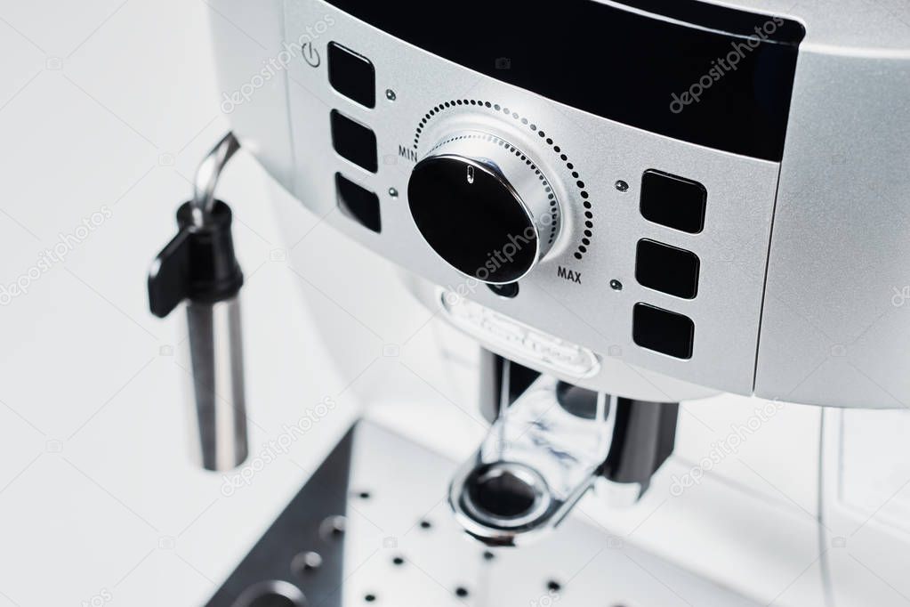 Close up of coffee machine on a white background