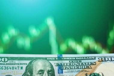 Doları banknot bulanık ekran Menkul Kıymetler Borsası verileri grafik karşı. Tonda fotoğraf. İş kavramı