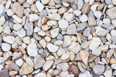 Bir deniz taşları ile arka plan doku. Nehir taşı ile soyut desen