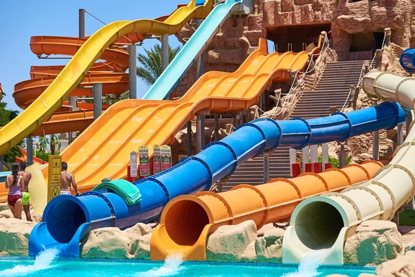 Colorful water slides in aqua park, closeup — Stock Photo, Image