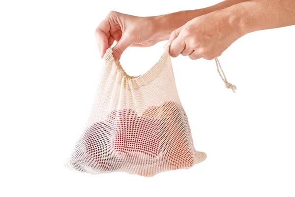 Woman hand hold fresh organic vegetables in textile bag. Zero wa — Stock Photo, Image