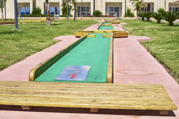 Miniature golf course in hotel. Entertainment for tourists at the hotel