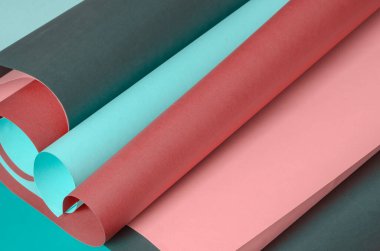 Pastel renkli renkli kağıt parşömenleri. Çeşitli tasarım işleri için yaratıcı çoklu görev arkaplanı. Uzayı kopyala Seçici odak.