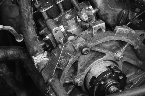Fragment of diesel engine of commercial truck. Fuel supply system. Car repair services. Car service. Monochrome photo.