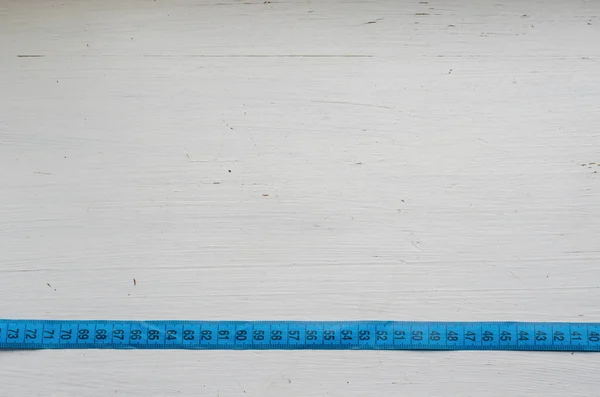 Ευθεία Γραμμή Μπλε Μεζούρα Κάτοψη Μπλε Ταινίας Μέτρησης Λευκό Ξύλινο — Φωτογραφία Αρχείου