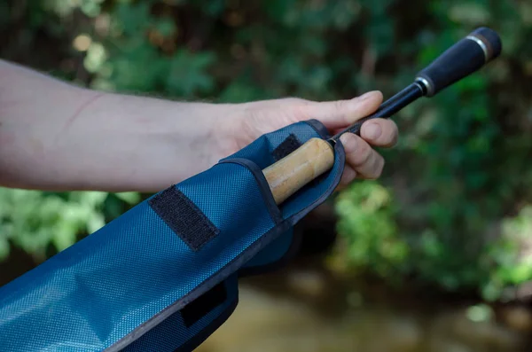 Man Hand Removes Baitcasting Rod Case Preparation Fishing Carbon Spinning — Stock Photo, Image