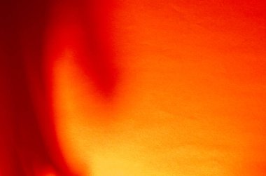 Değişim ve gölgelerle soyut kırmızı arkaplan. Çeşitli tasarım görevleri için çoklu görev geçmişi. Tasarım, dekorasyon, reklam.