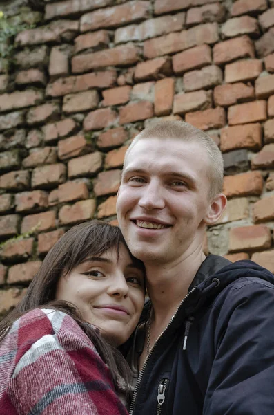 Portrait Young Heterosexual Couple Standing Embrace Young Woman Long Dark — Stock Photo, Image