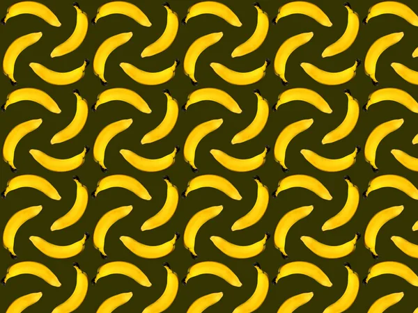 Modello Senza Cuciture Banane Uno Sfondo Verde Scuro — Foto Stock