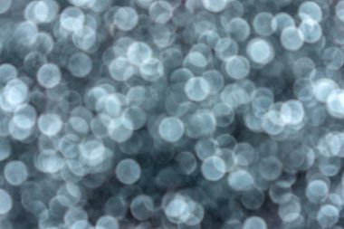  Bulanık küçük gümüş ışıklar. Harika bir geçmiş..