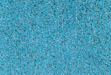 Açık mavi küçük taşların arkaplan dokusu.