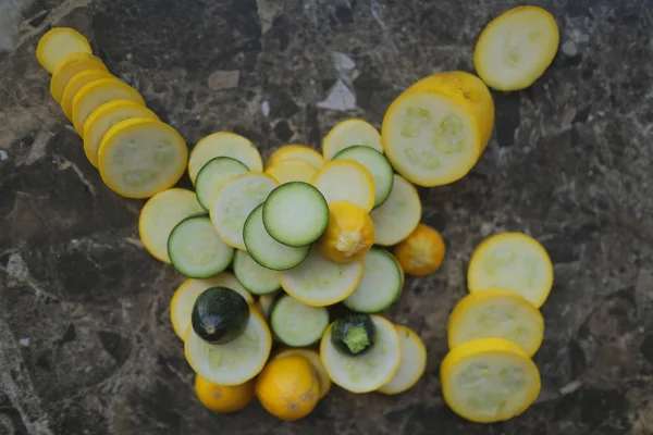 Yellow and green zucchini, cut into circles
