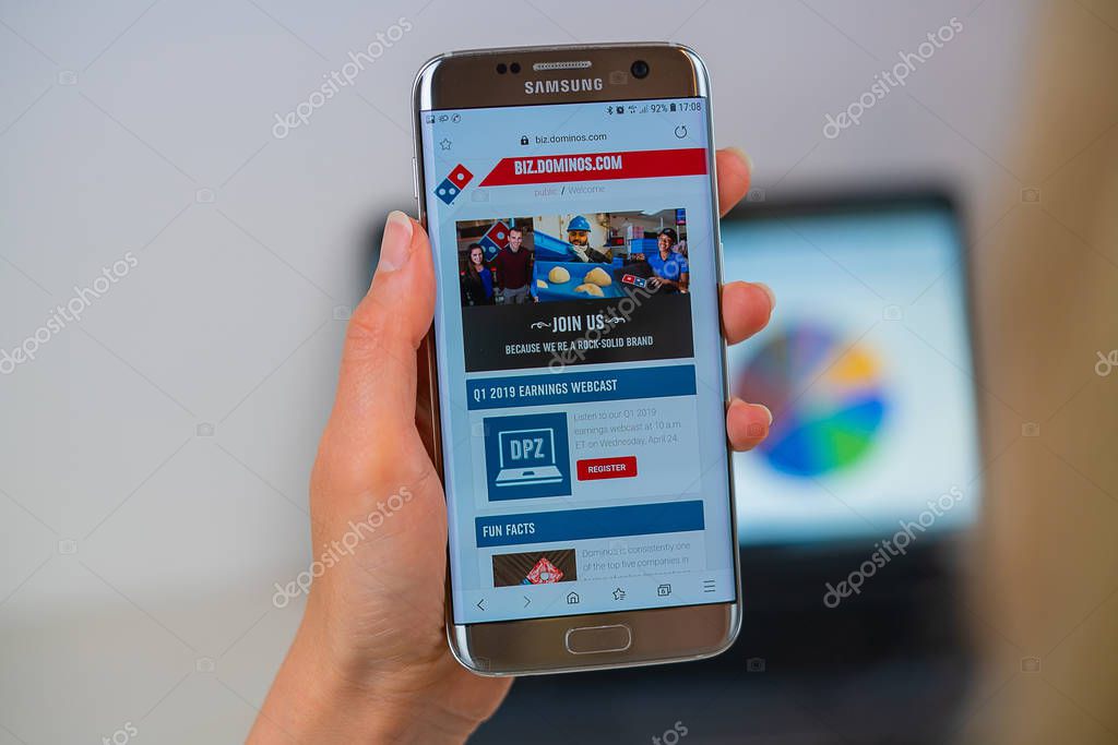 Barcelona / Spain 05 25 2019: Dominos pizza web site on mobile phone screen. Mobile version of Dominos pizza company web page on smartphone. Official web page of Dominos pizza.