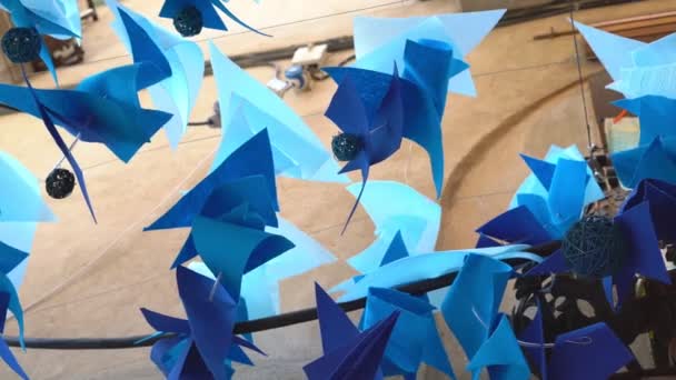 Street decor made of colorful blue napkins — Stock Video