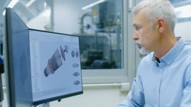 Kıdemli yeşil Mock-up ekranda bulunan bir kişisel bilgisayarda çalışan mühendis o tasarımı yeni Cad programı bileşenidir. Ofis pencere bileşenleri üretim fabrikası dışında görünür olduğunu.
