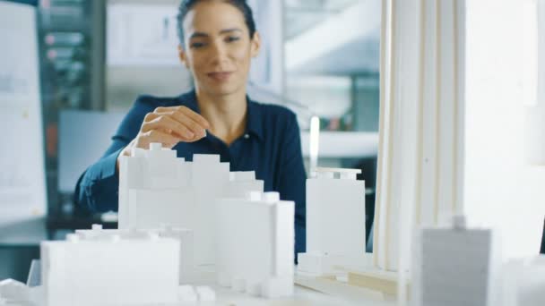 Female Architectural Designer Adds Component Building Model She Works City — Stock Video