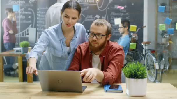 Female Designers Consults Male Developer While Works Laptop Background Stylish — Stock Video