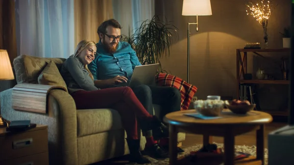 Girlfriend Boyfriend Sitting Sofa Laptop His Knees Watching Videos Having — Stock Photo, Image