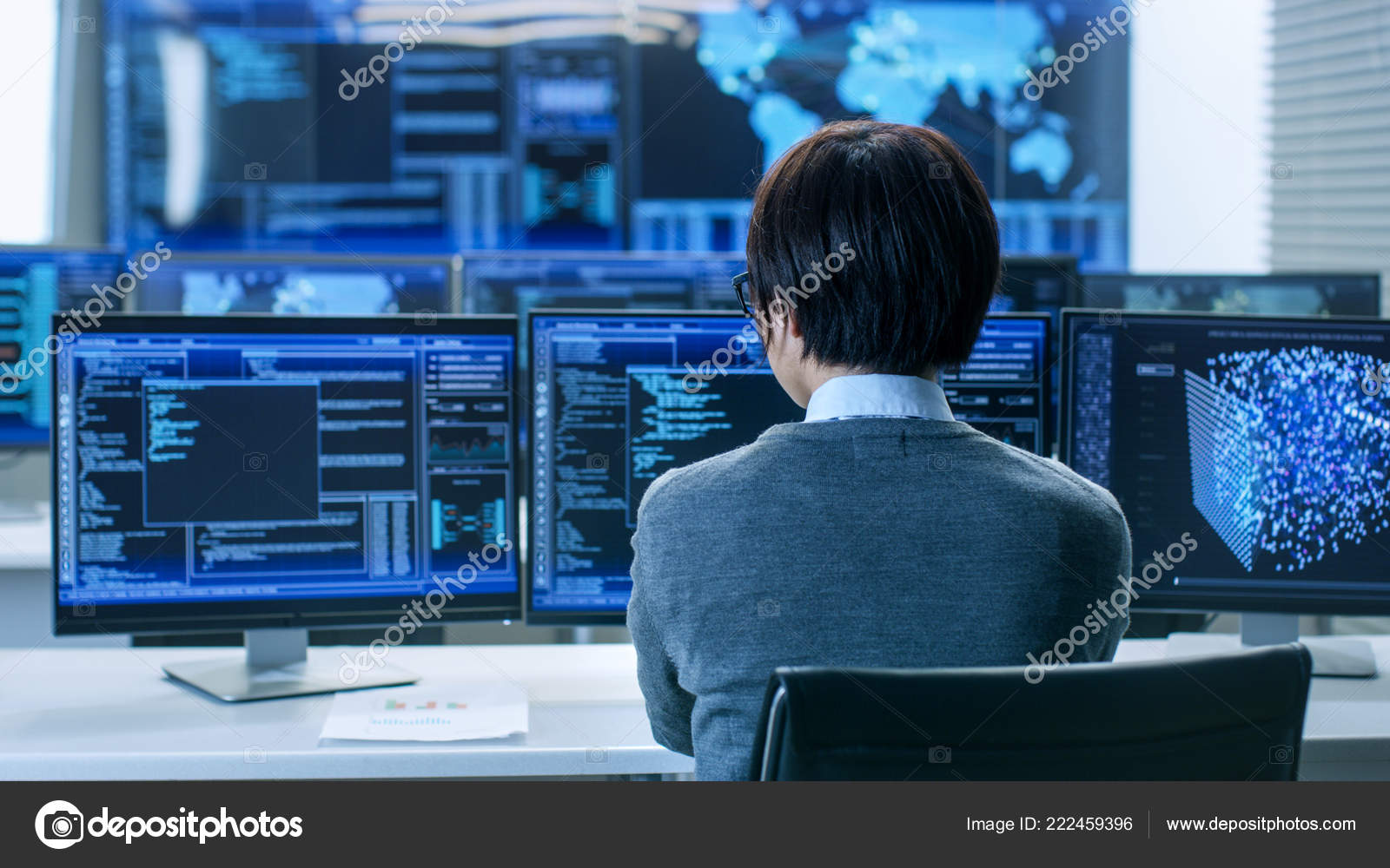System Control Room Technical Operator Works His Workstation