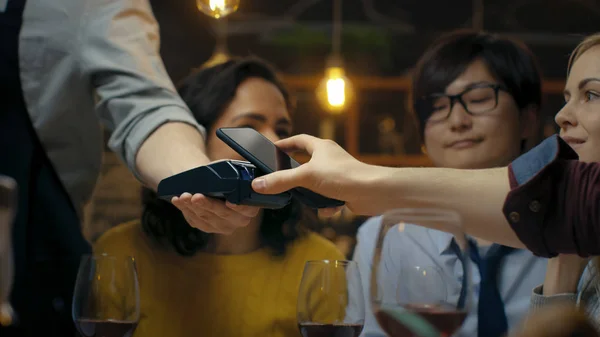 Bar Waiter Holds Credit Card Payment Machine Man Pays His — Stock Photo, Image