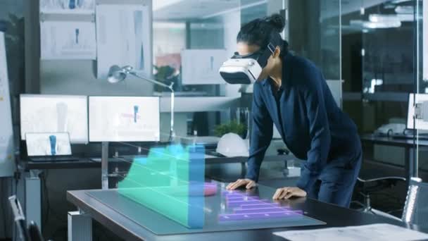 Office Professional Woman Wearing Augmented Reality Headset Interacts Infographics Showing — Vídeo de stock