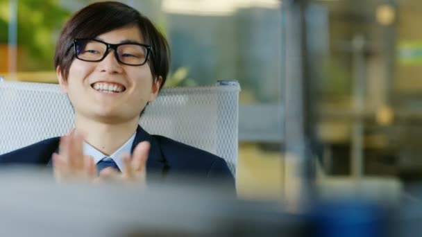 Portrait Japanese Businessman Wearing Suit Glasses Sitting His Desk Starts — Stock Video
