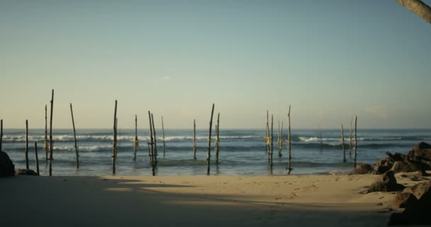 Slow Motion Shot Fishing Stilts Sticking Out Sea Culture Old — Stock Video