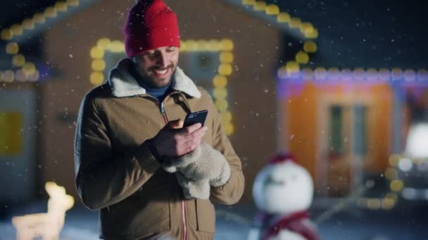 Handsome Young Man Uses Smartphone While Standing Backyard His Idyllic — Stock Video