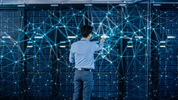 Internet Web Concept. Shot In the Modern Data Center: IT Engineer Standing Beside Open Server Rack Cabinets and Touching Digital Connections on a Server. — Stock Photo, Image